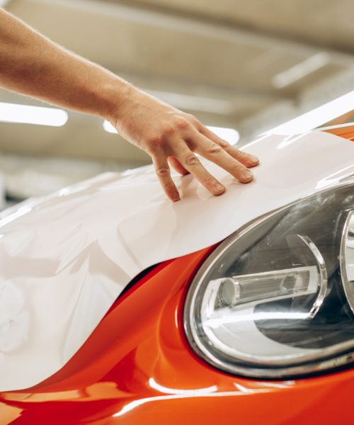 Car wrapping with foil at car service